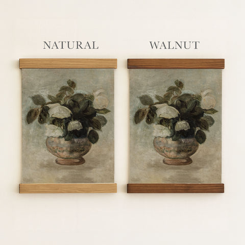 two framed paintings of a vase with flowers, one labeled 
