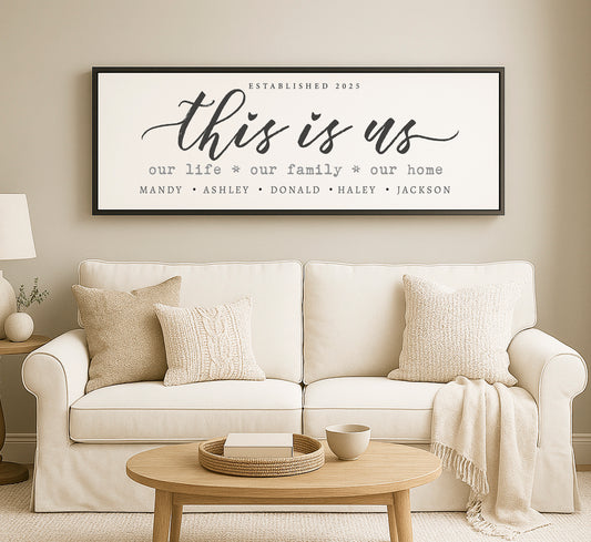 a living room with a white couch and a coffee table