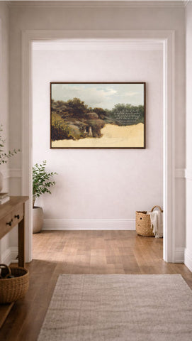 a hallway with a painting hanging on the wall, a wooden floor, and a rug on the floor.