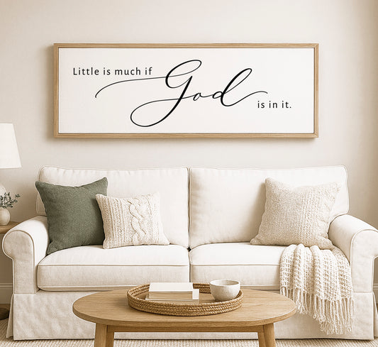 a living room with a white couch and a coffee table