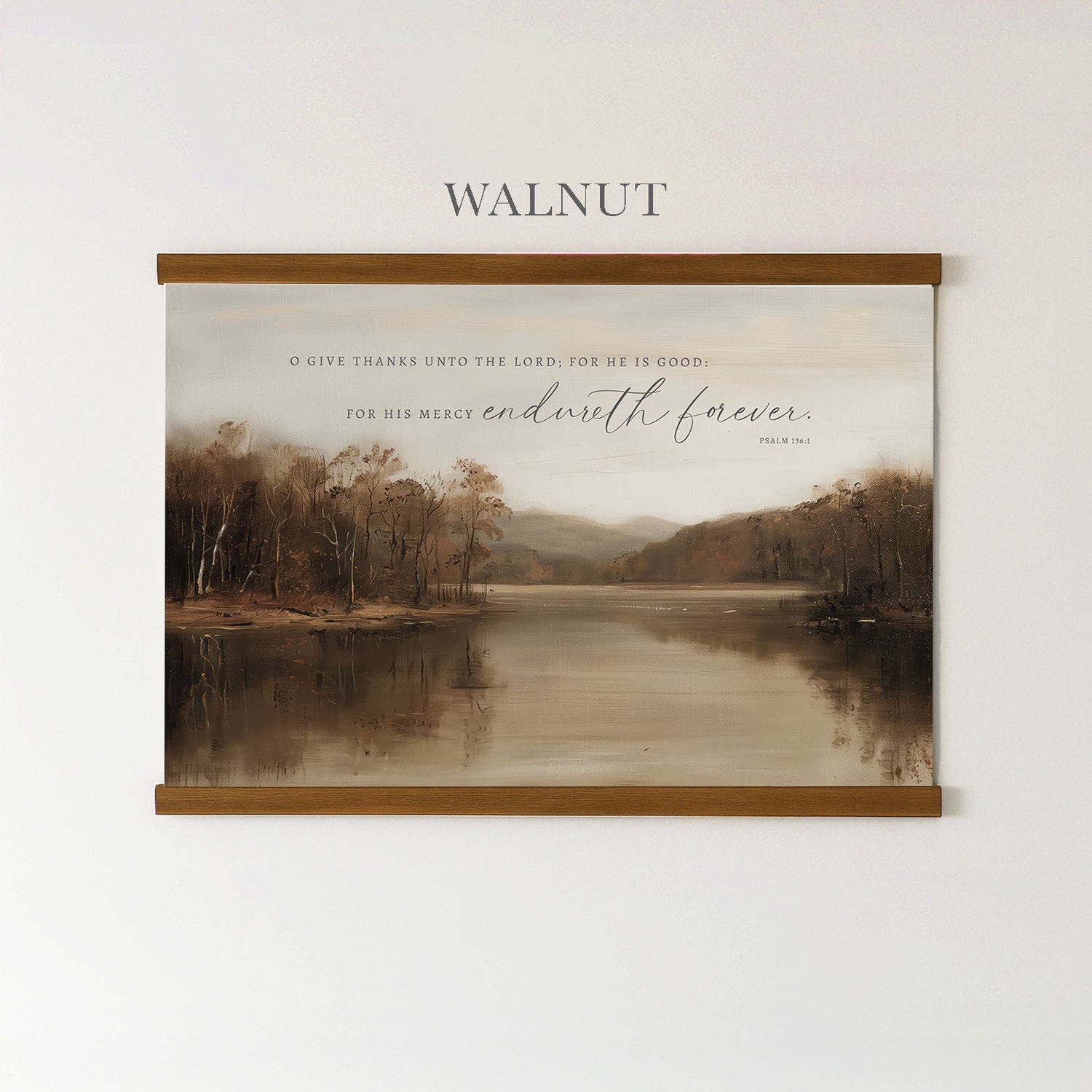 The image is a framed print of a serene landscape featuring a lake surrounded by trees, with a quote from the Bible above it.