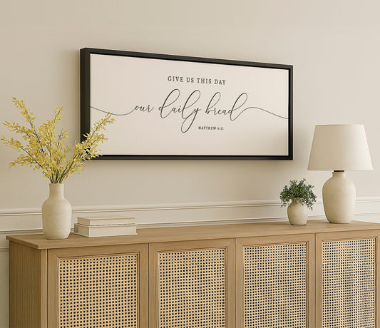 a picture hanging on a wall above a dresser