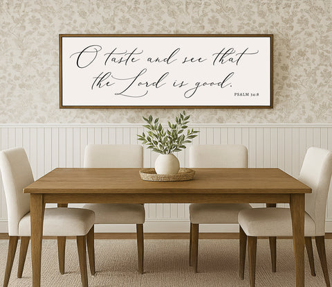 a dining room table with a vase of flowers on it