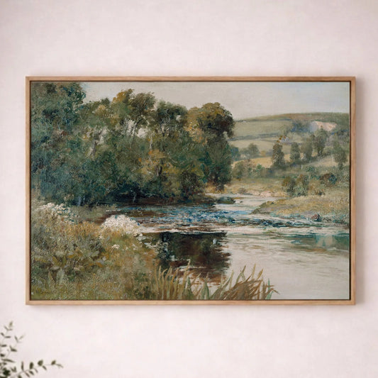 a large landscape painting hanging on a wall, depicting a serene scene of a river surrounded by trees and greenery.
