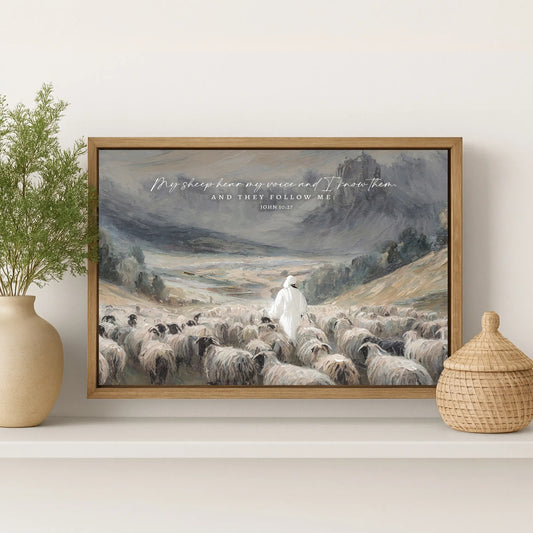 The image is a framed painting depicting a shepherd tending to his flock of sheep in a mountainous landscape.