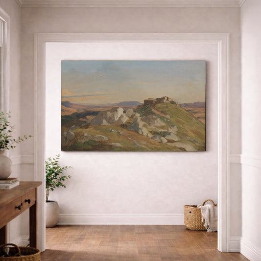 a large landscape painting hanging on a white wall in a hallway.
