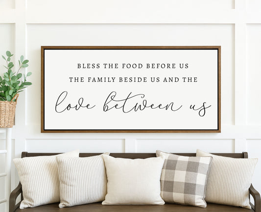 a picture of a living room with a couch and pillows