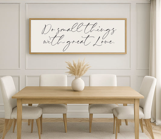 a dining room table with a vase of flowers on top of it