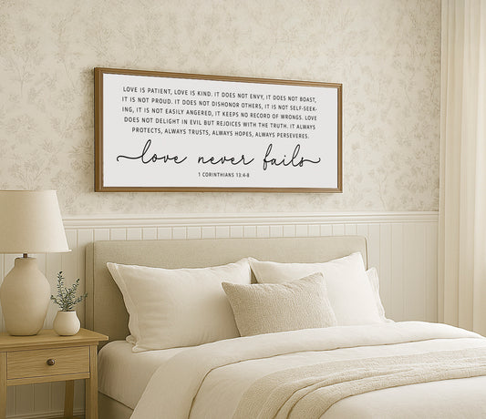 a bedroom with a bed and a picture on the wall