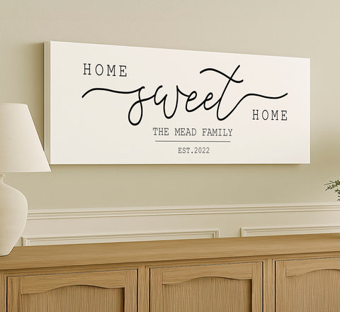 a sign that says home sweet the mead family