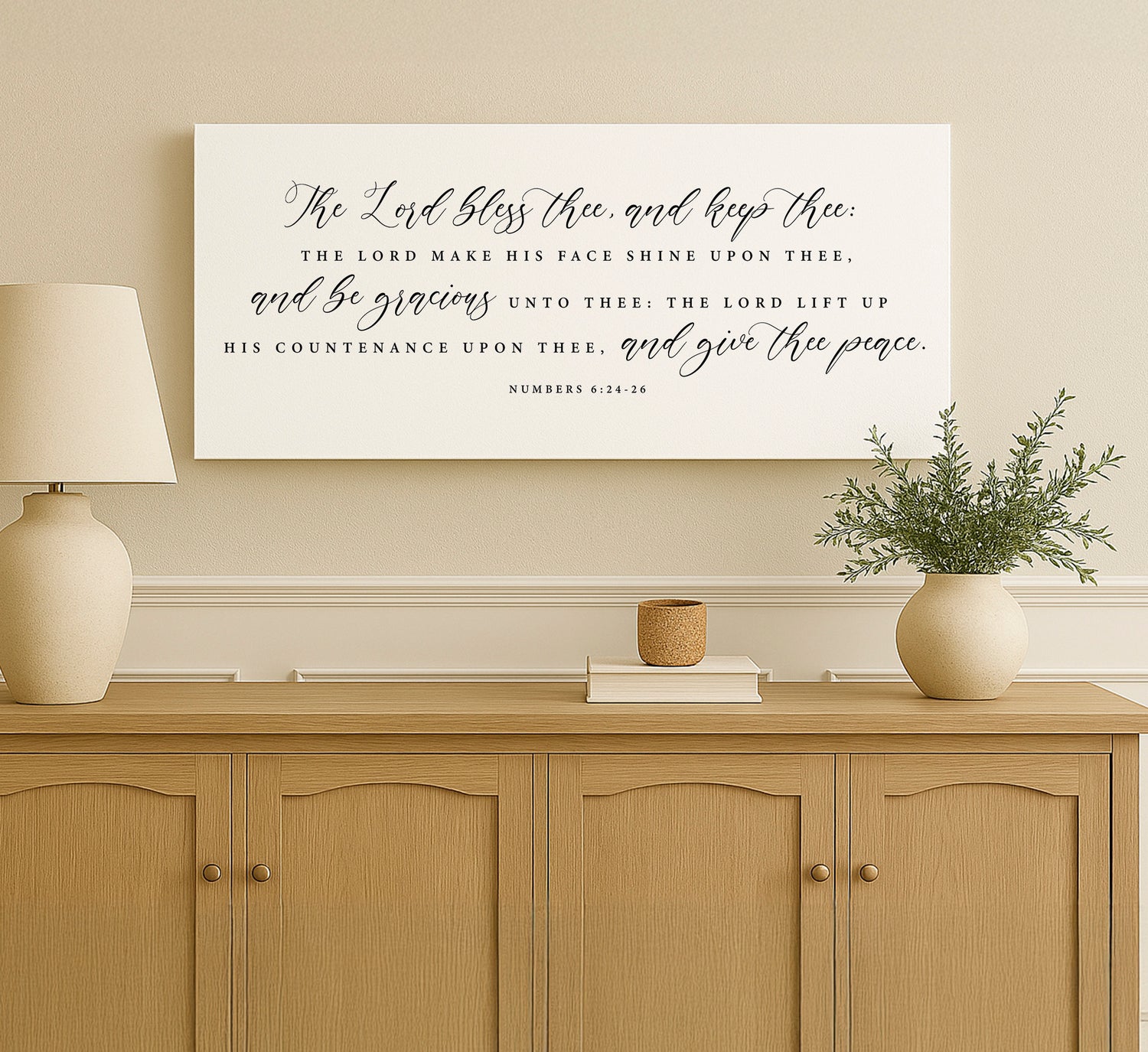 a picture of a quote on a wall above a dresser