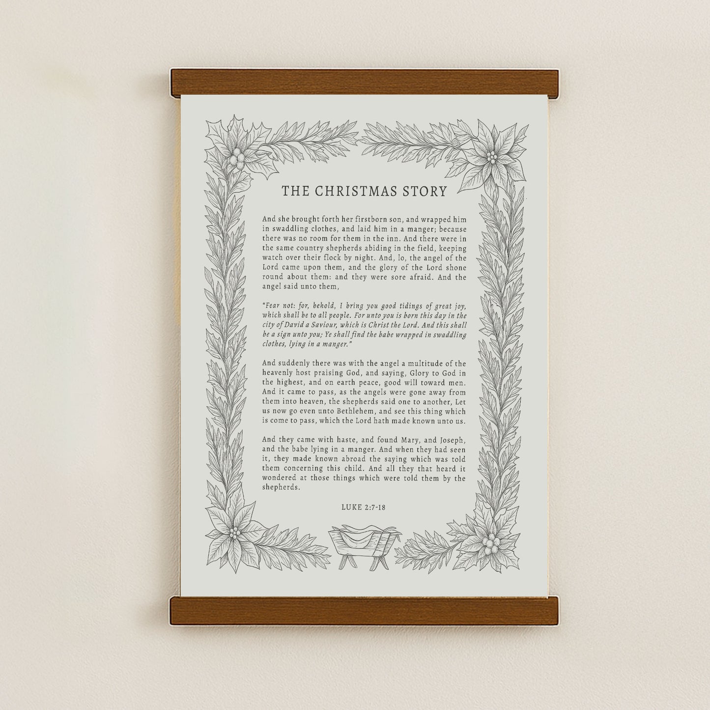 The image is a framed print of a Christmas-themed text, featuring a decorative border with a floral design.