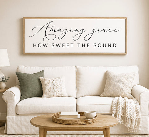 a living room with a white couch and a coffee table