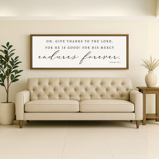 a living room with a couch and potted plant