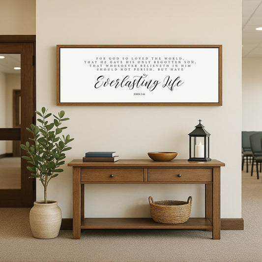 a wooden table with a vase and a potted plant on top of it