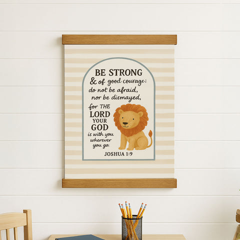 a poster with a lion and a Bible verse, along with a wooden frame.