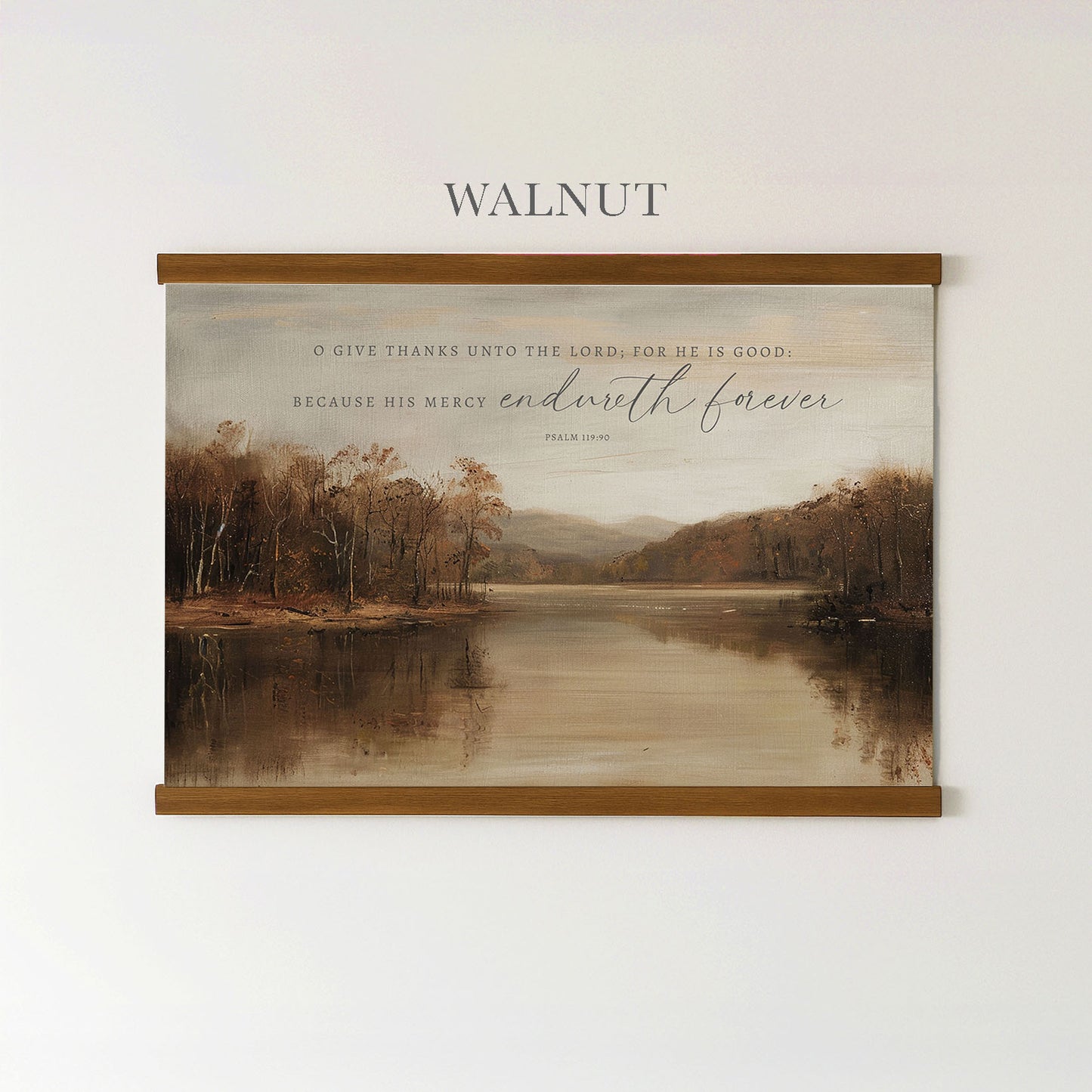 The image is a framed painting of a serene landscape with a lake and trees, hanging on a wall.