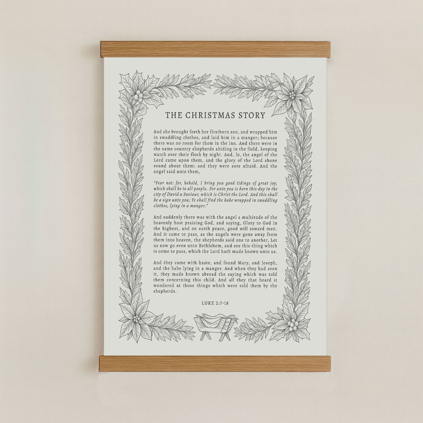 The image is a framed print of a Christmas story, featuring a decorative border with a floral design.
