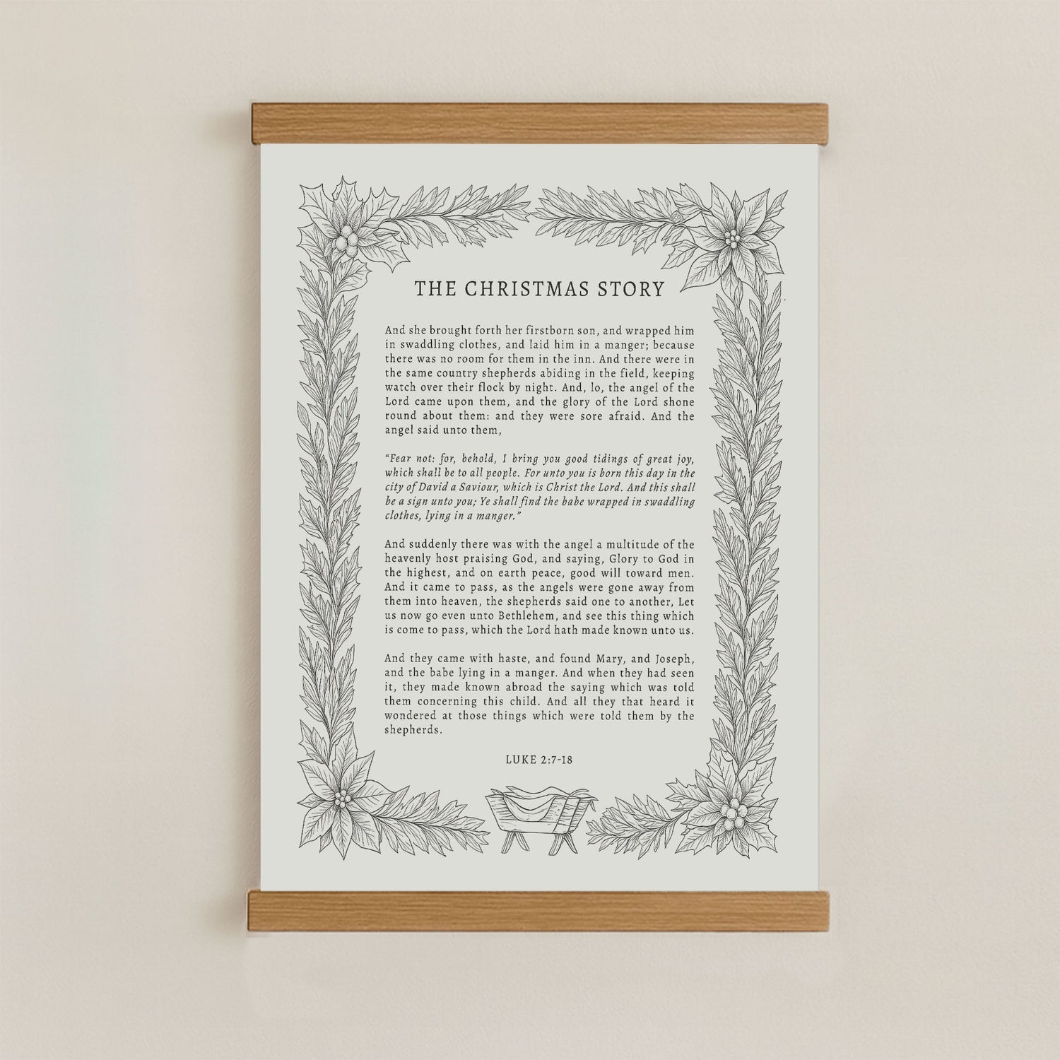 The image is a framed print of a Christmas story, featuring a decorative border with a floral design.