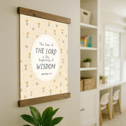 a wall hanging with a quote from Proverbs 9:10, which reads "The fear of THE LORD is the beginning of Wisdom".
