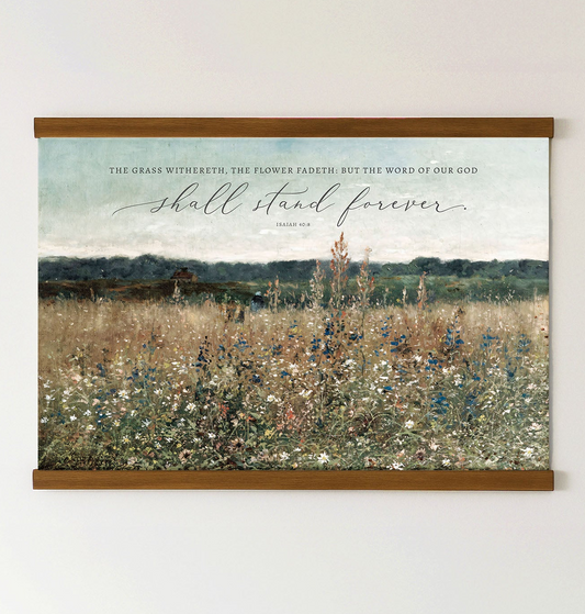 The image is a painting of a field with tall grass and wildflowers, featuring a quote from the Bible verse "The grass withheret, the flower fadeth, but the word of our god shall stand forever."