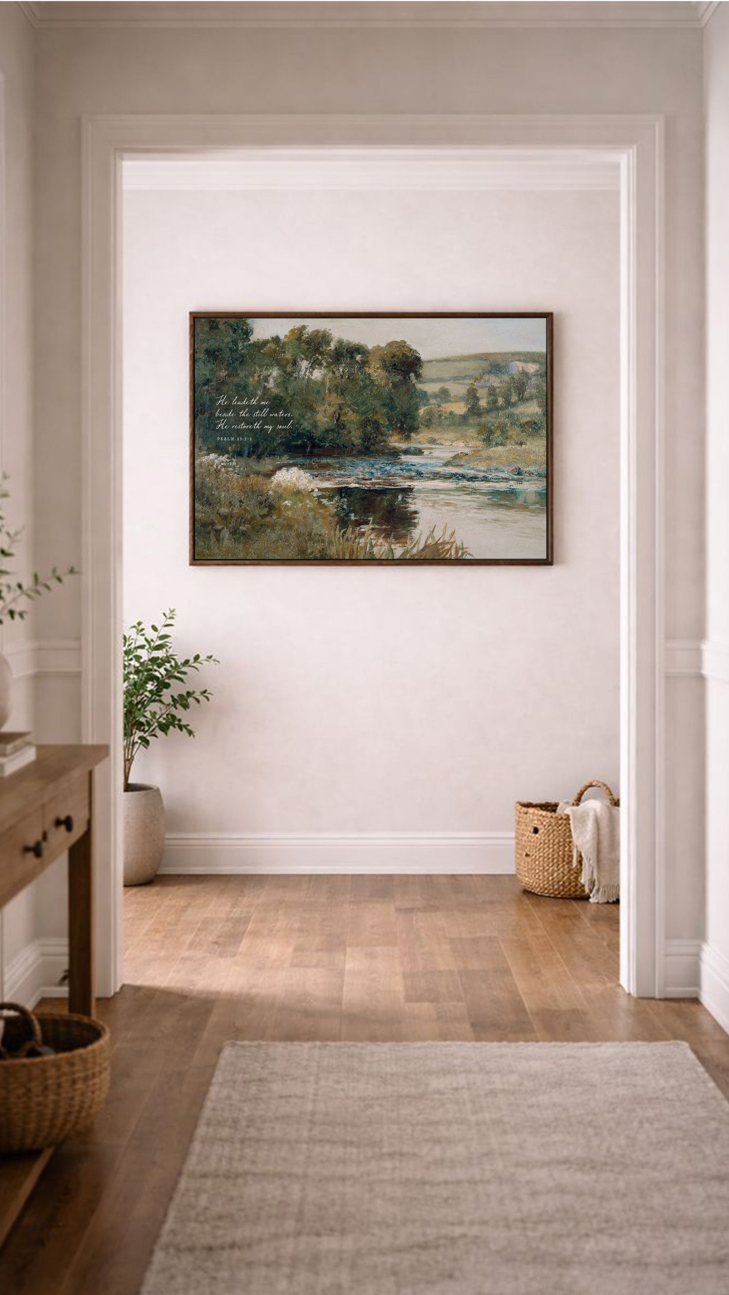 a large painting of a serene landscape hanging on a white wall in a hallway. The painting depicts a peaceful scene with a river, trees, and a field, creating a calming atmosphere. The hallway has a wooden floor and a rug, adding to the overall aesthetic of the space.