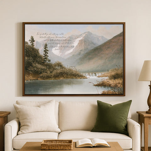 a serene landscape with a mountain range, a river, and lush greenery. The painting is hung on a wall above a white couch, which has a basket on it. The couch is positioned in front of a coffee table, and there is a lamp on a side table next to the couch.