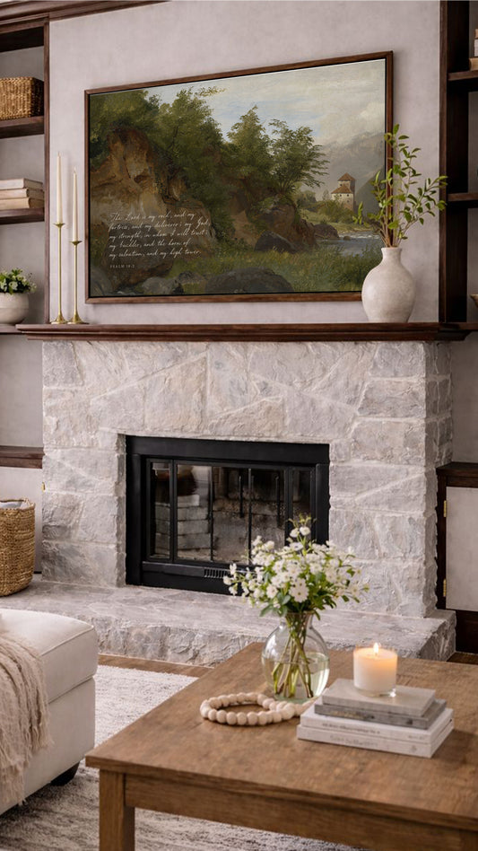 a cozy living room with a stone fireplace, a wooden coffee table, and a painting of a landscape above the fireplace. The room is decorated with a vase of flowers, a candle, and some books, creating a warm and inviting atmosphere.