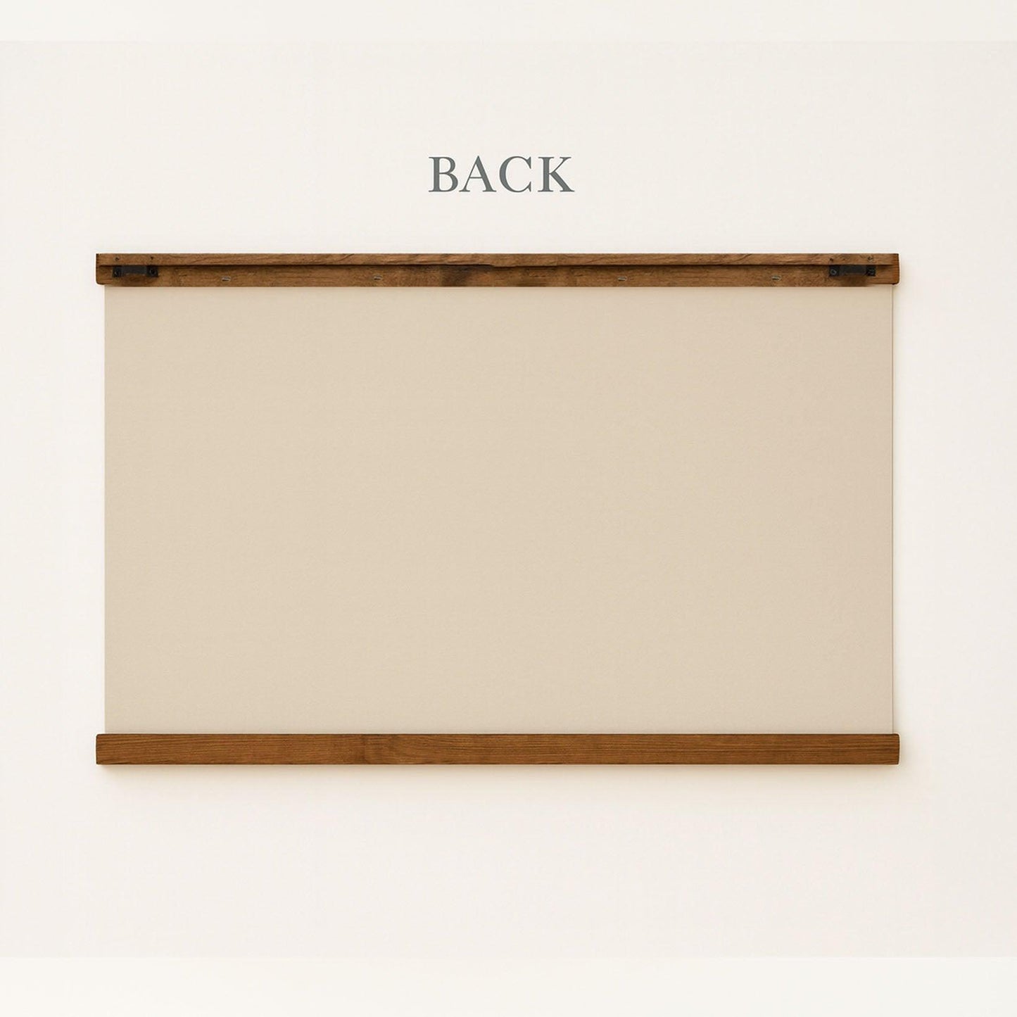 a blank canvas or board mounted on a wall, with the word "BACK" written above it.